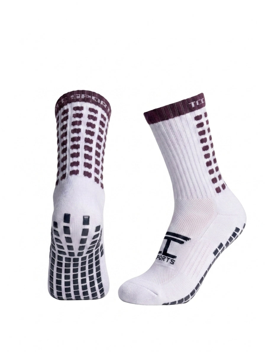 TCC Sports maroon and white grip socks showing the side profile and silicone grip sole.