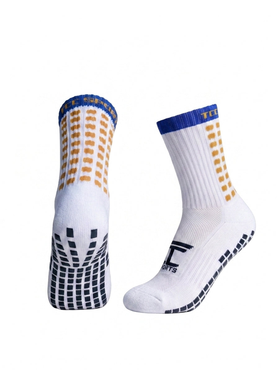 TCC Sports blue and amber grip socks showing the side profile and silicone grip sole.