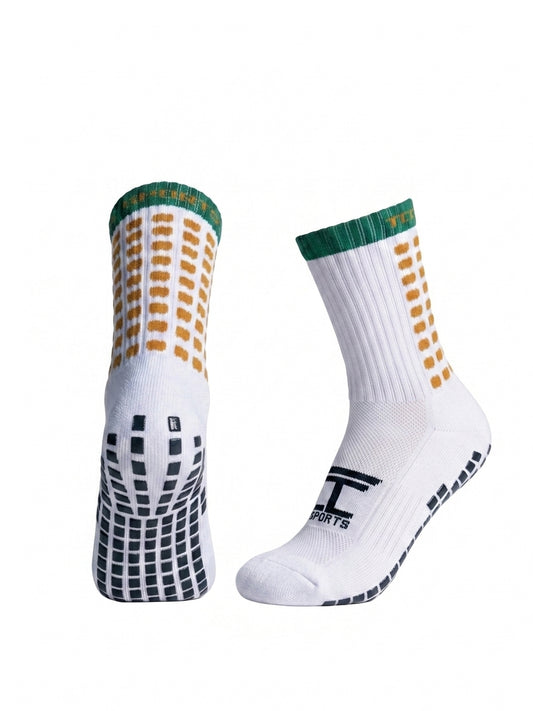 TCC Sports green and amber grip socks showing the side profile and silicone grip sole.