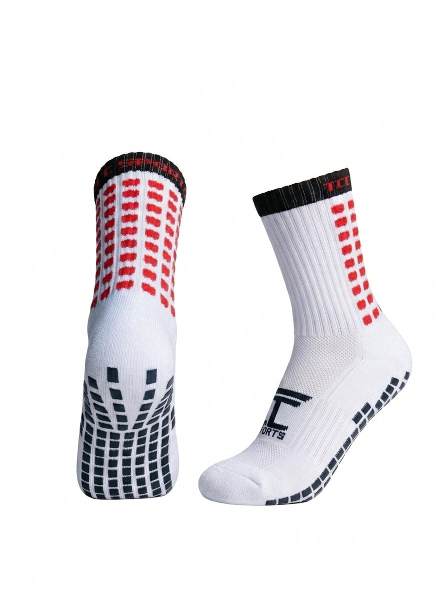 TCC Sports black and red grip socks showing the side profile and silicone grip sole.