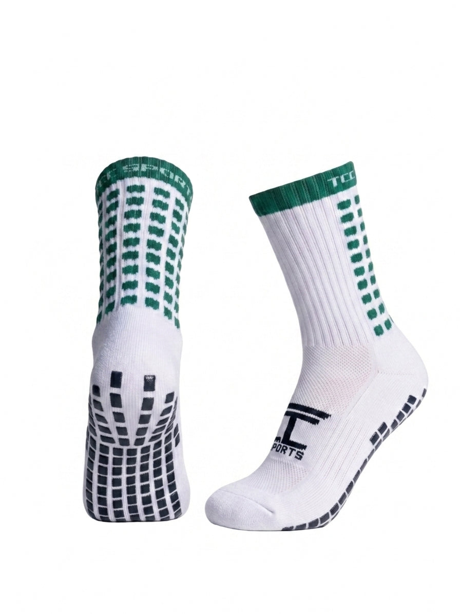 TCC Sports green and white grip socks showing the side profile and silicone grip sole.