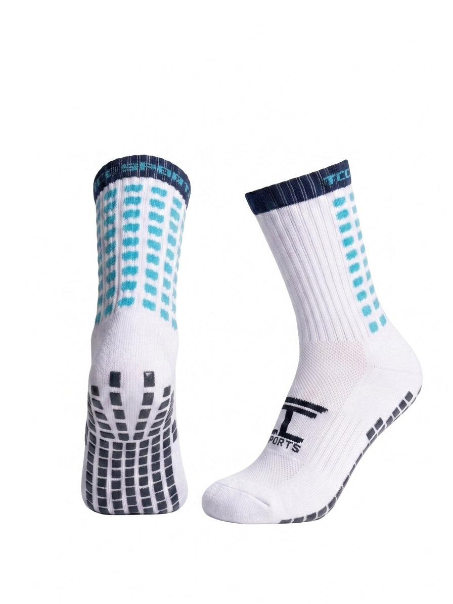 TCC Sports navy and light blue grip socks showing the side profile and silicone grip sole.
